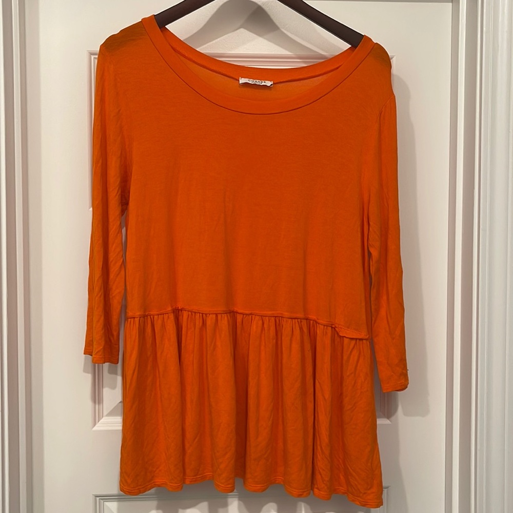 bright orange boutique baby doll peplum ruffle top